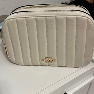 Coach. New with out tag. Cross body purse.